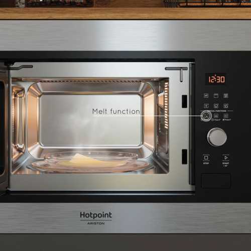 Microondas Hotpoint MF20GIXHA electrónico con grill